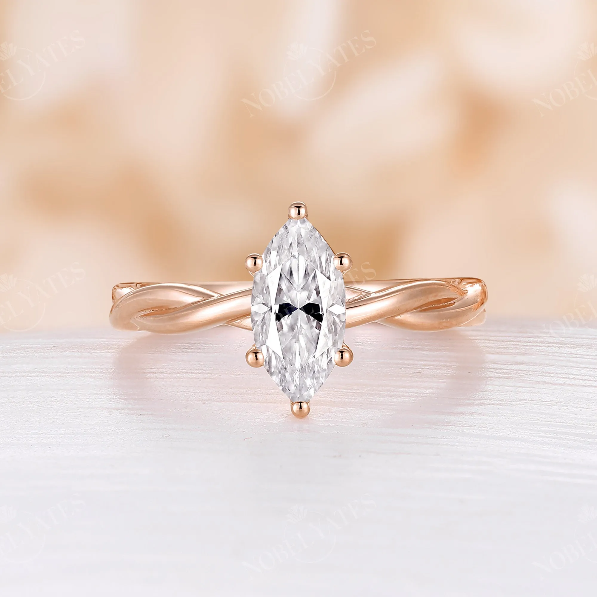 Solitaire Marquise Moissanite Twist Engagement Ring Rose Gold