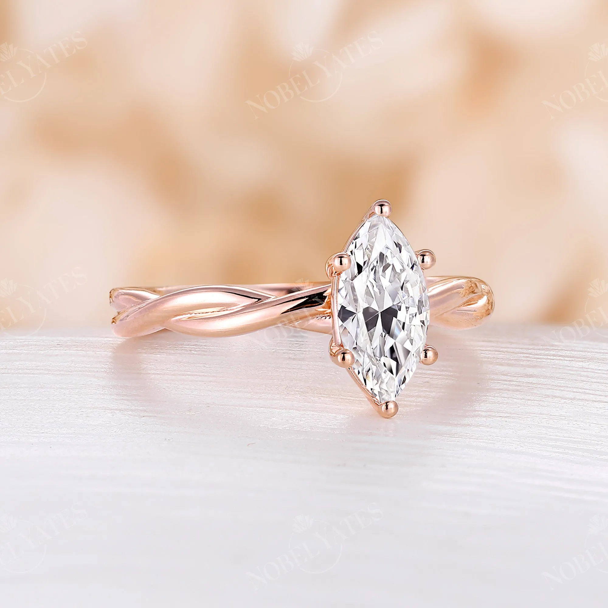 Solitaire Marquise Moissanite Twist Engagement Ring Rose Gold