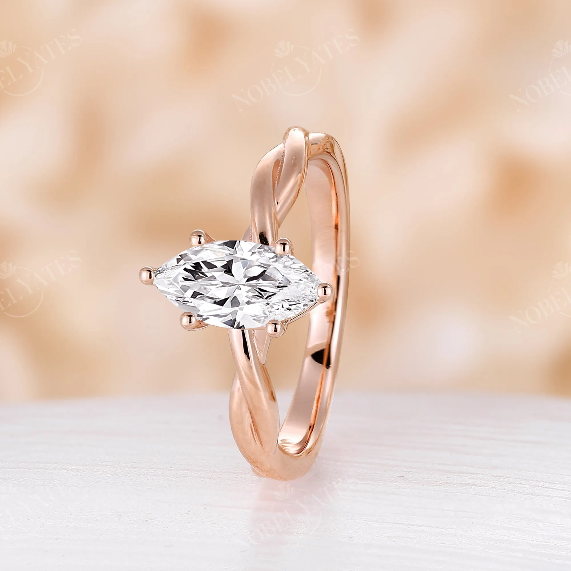 Solitaire Marquise Moissanite Twist Engagement Ring Rose Gold